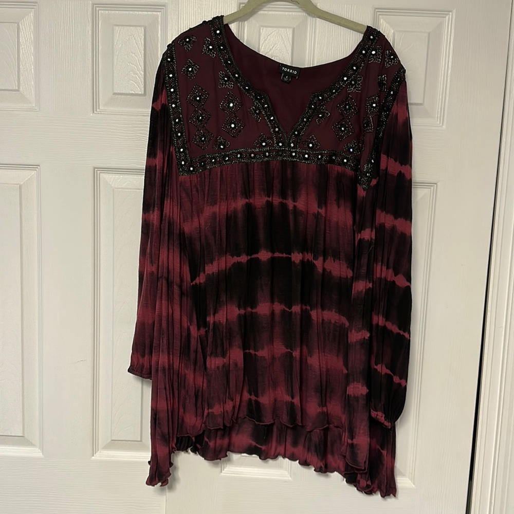 Beautiful Torrid top never worn but tag was removed.
